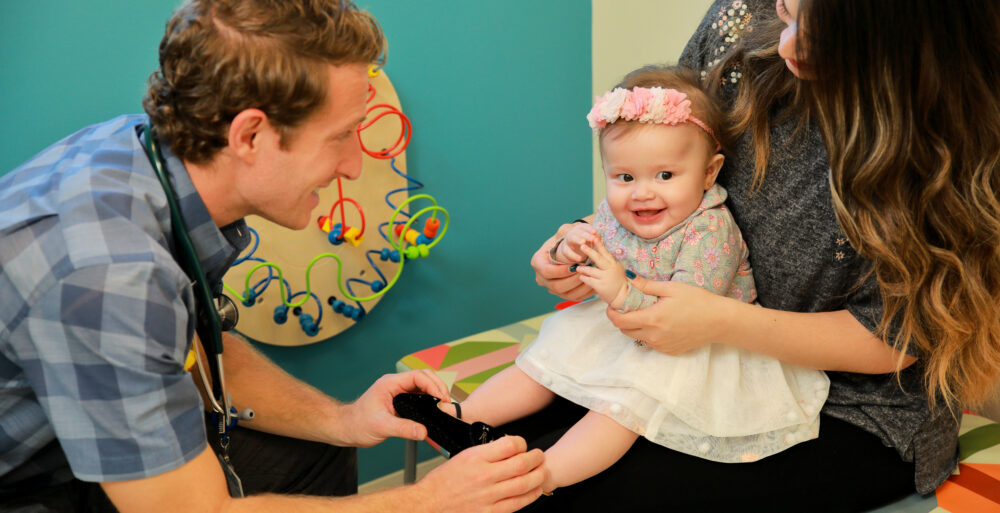 Holtzberg with a baby