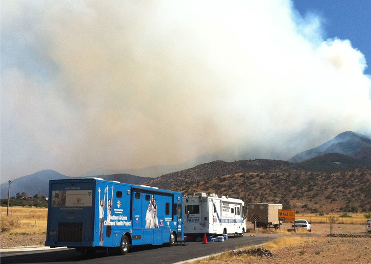 Monument Fire CCHCI Mobile Medical Clinic provides medical support to the Sierra Vista community during the Monument Fire, 2011.