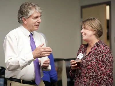 Dennis Walto, chief external affairs officer and executive director with the Chiricahua Community Health Center and Cochise County Health and Social Services Director Barbara Lang talks while attending this week’s ACF function in Sierra Vista. MARK LEVY HERALD/REVIEW