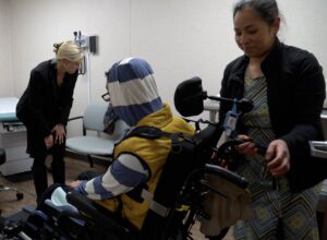 From left, Dr. Darlene Melk welcomes Efren Carmona, 15, and his mother, Araceli Faustillas, into a patient room at the Chiricahua Community Health Centers clinic in Willcox, Ariz., on Feb. 20, 2026. Nate Huffman/AZPM