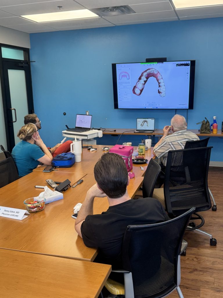 Painless Precision: Chiricahua Transforms Dental Care in Cochise County 2 Chiricahua Dental team learning how the intraoral scanner works