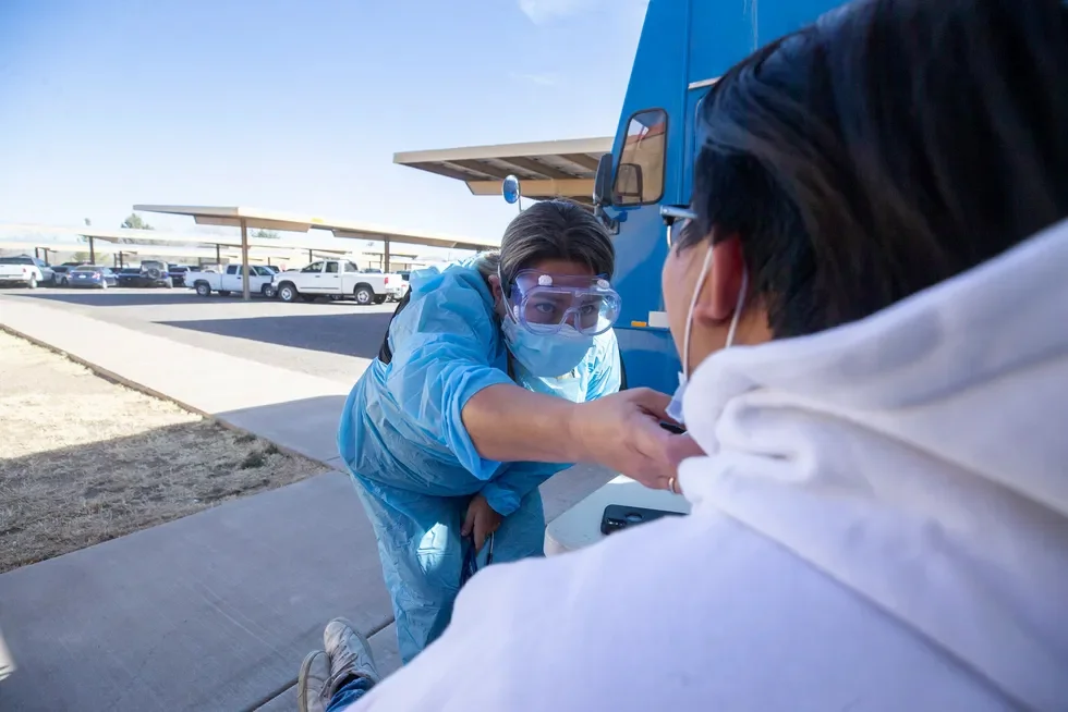 Karina caring for a patient